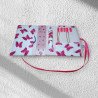 Pochette à bijoux modèle papillons fuchsia 